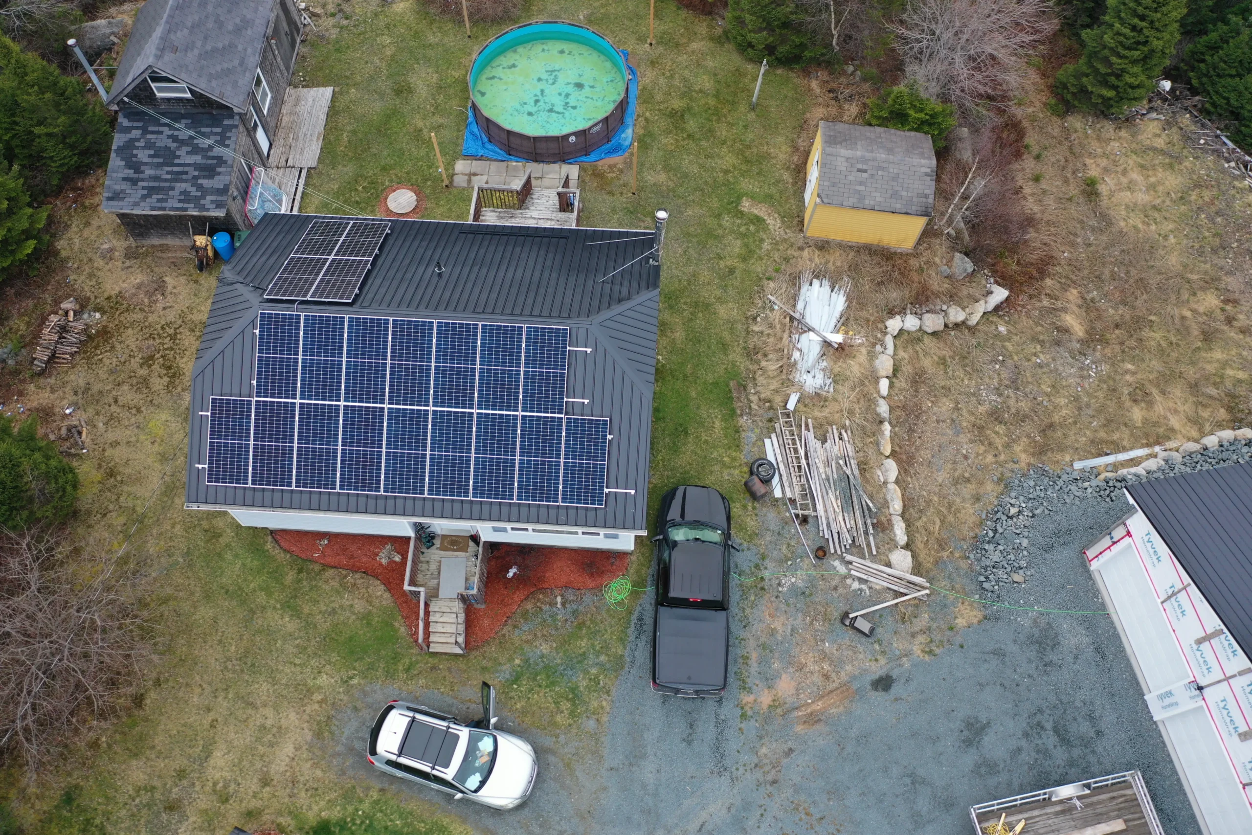 Aerial view of a residential solar panel installation in Halifax, Nova Scotia