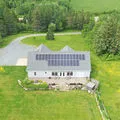 Aerial view of a residential solar panel installation in Nova Scotia
